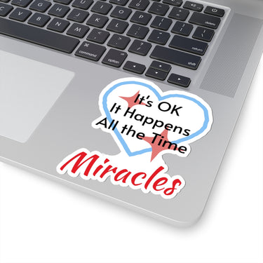 Large vinyl sticker with “Miracles Happen” design, message “It’s OK. It Happens All the Time – Miracles,” glossy finish, faith-based sticker are daily reminders of God’s tangible goodness, 4-inch sticker on laptop